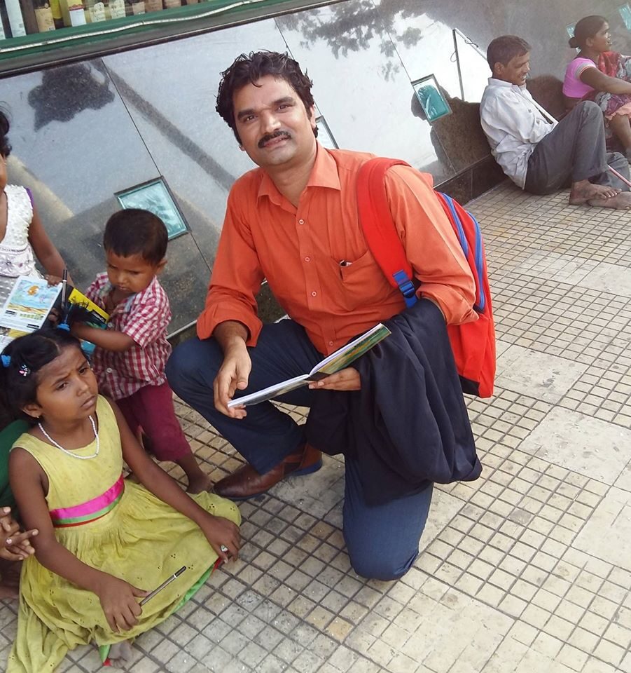 Santosh Talaghatti on street-level community outreach.